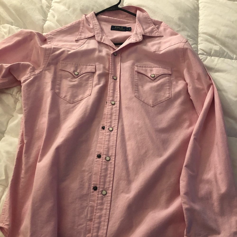 Men’s polo button used once.